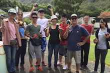 Taiwanese students play bocce ball at Magoon